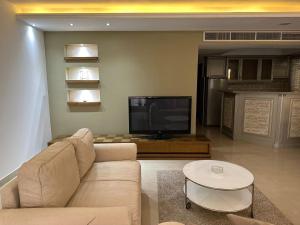 A television and/or entertainment centre at Rentrific