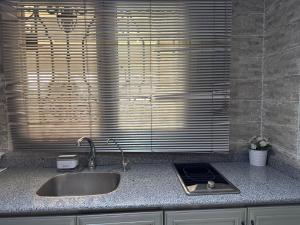 A kitchen or kitchenette at Rentrific