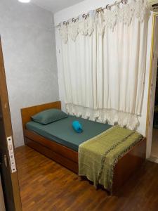 The Place Hostel tesisinde bir odada yatak veya yataklar
