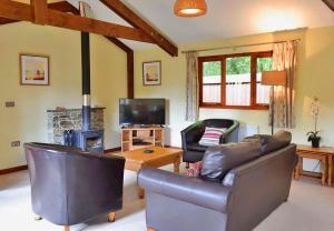 Zona d'estar a Finest Retreats- Little Dunley - Oaktree Cottage
