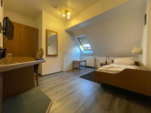 Postel nebo postele na pokoji v ubytování Krügers Hotel
