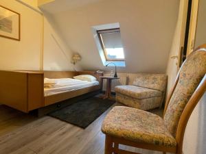 Postel nebo postele na pokoji v ubytování Krügers Hotel