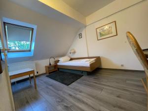 Postel nebo postele na pokoji v ubytování Krügers Hotel