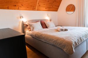 Postel nebo postele na pokoji v ubytování Cottage in Domasa 2