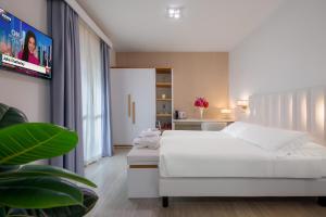 Postel nebo postele na pokoji v ubytování Hotel Acapulco
