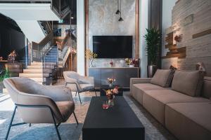 Χώρος καθιστικού στο Hotel Lonca