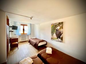 Posteľ alebo postele v izbe v ubytovaní Hotel Pinguino
