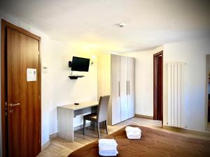 Posteľ alebo postele v izbe v ubytovaní Hotel Pinguino