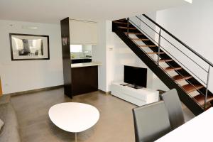 TV a/nebo společenská místnost v ubytování Homenfun Barcelona Paseo de Gracia Diagonal