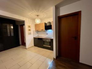 a kitchen with a sink and a stove top oven at Wunderschönes Apartment in der Goldstadt Pforzheim in Pforzheim