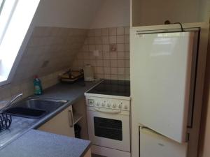 Kuchyň nebo kuchyňský kout v ubytování Haus Mara