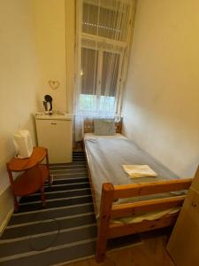 Posteľ alebo postele v izbe v ubytovaní Wesselényi Rooms near Gozsdu Udvar