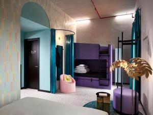 Cama ou camas em um quarto em JO&JOE ROMA