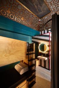 Cama ou camas em um quarto em JO&JOE ROMA