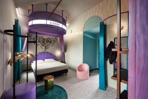 Cama ou camas em um quarto em JO&JOE ROMA