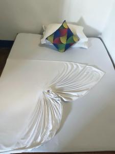 Postel nebo postele na pokoji v ubytování STONE TOWN RAFIKI HOSTEL