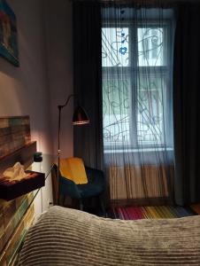 Posteľ alebo postele v izbe v ubytovaní Family Stay in Lviv (2 Rooms + Kitchen)