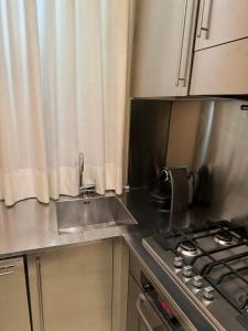 Kuchyň nebo kuchyňský kout v ubytování Residenza del Corso + 9 fotografií