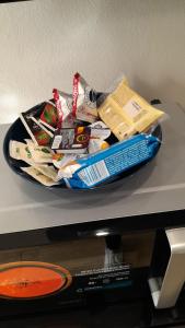 a bowl of food on top of a counter at PIGRO House - Bologna Airport Suite in Bologna +25 photos