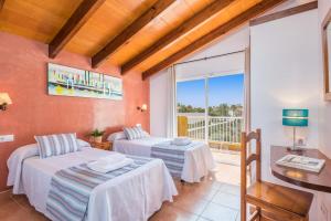 Ένα ή περισσότερα κρεβάτια σε δωμάτιο στο Villa Samuel by Villa Plus +14 φωτογραφίες