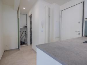 a kitchen with white walls and a counter top at Appartement Menton, 2 pièces, 4 personnes - FR-1-196-340 in Menton