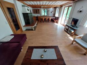 a living room with a couch and a table at Chalet Peter in Zell am See