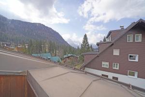 a view of a mountain from a house at iFlat Madonna di Campiglio Penthouse Brenta in Madonna di Campiglio