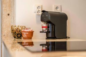 Comodidades para preparar café e chá em Albergue do Infante