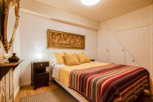 Cama ou camas em um quarto em Albergue do Infante