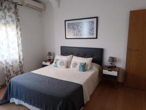 Letto o letti in una camera di Confortable Apartamento * La Marina de Valencia