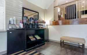 a room with a bar with a table and a stool at Extended Stay America Suites - Birmingham - Wildwood in Birmingham