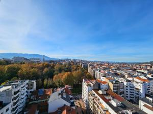 a view of a city with buildings and trees at Mirador La Jirafa - 638A in Oviedo