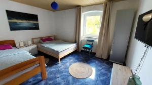 Postel nebo postele na pokoji v ubytování Grand Central