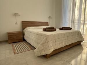 a bedroom with two beds in a room at Sweet home in Bordighera