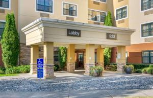 a lobby of a building with a library sign on it at Extended Stay America Suites - Seattle - Bothell - West in Bothell