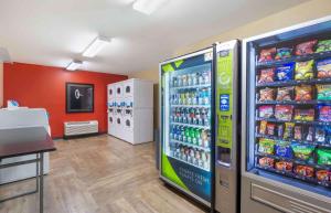a store with a soda machine in a room at Extended Stay America Suites - Seattle - Lynnwood in Lynnwood