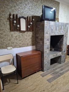 TV a/nebo společenská místnost v ubytování GUEST HAUSE & HOSTEL 15a