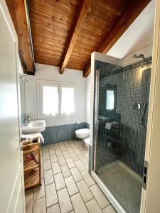 a bathroom with a shower and a sink at Country house 15km from Bologna in Budrio