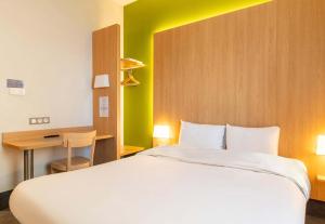Postel nebo postele na pokoji v ubytování B&B HOTEL Limoges Centre Gare