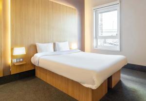 Postel nebo postele na pokoji v ubytování B&B HOTEL Limoges Centre Gare
