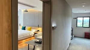 Postel nebo postele na pokoji v ubytování Lanshan Moon Resort
