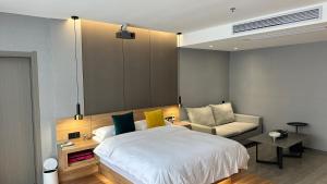 Postel nebo postele na pokoji v ubytování Lanshan Moon Resort