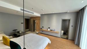 Postel nebo postele na pokoji v ubytování Lanshan Moon Resort