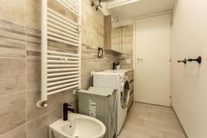 a small bathroom with a toilet and a sink at Crescenzago#34, vicino Metro M2 e Ospedale San Raffaele in Milan +21 photos