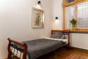 Posteľ alebo postele v izbe v ubytovaní Sewa Apartments
