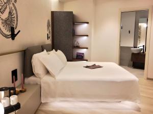 Postel nebo postele na pokoji v ubytování Panorama Hotel Friuli - Boutique Hotel