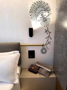 Postel nebo postele na pokoji v ubytování Panorama Hotel Friuli - Boutique Hotel