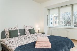 Katil atau katil-katil dalam bilik di Bright Apartment near Central Station/ URBAN RENT