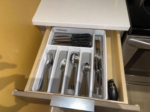 a drawer filled with utensils in a kitchen at Full Kitchen-youtubetv-smart Locksking Bedtop Fl in Tacoma