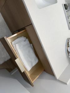a cabinet with a white towel inside of it at Full Kitchen-youtubetv-smart Locksking Bedtop Fl in Tacoma